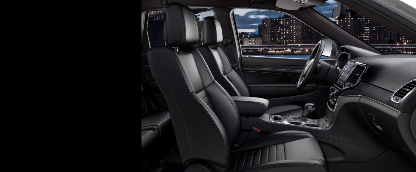 An interior view of the CommandView sunroof on the 2020 Jeep Grand Cherokee Limited X with the front pane open.