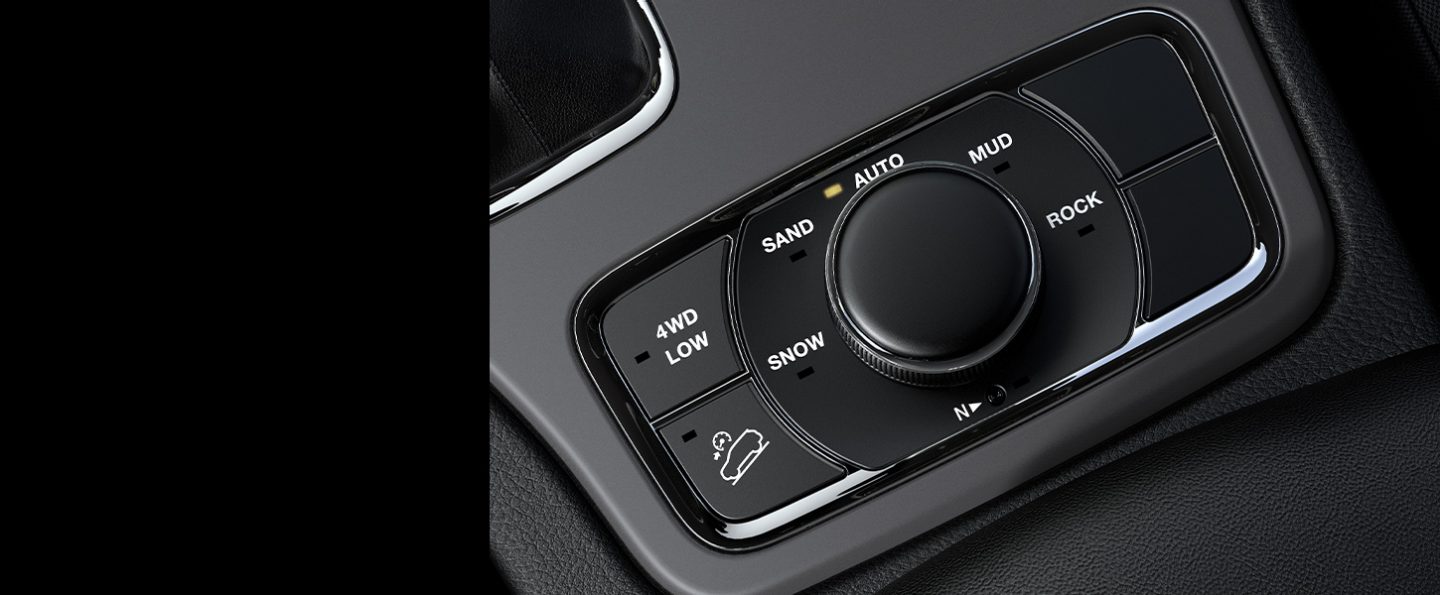 The Selec-Terrain Traction Management controls available on the 2020 Jeep Grand Cherokee Upland.