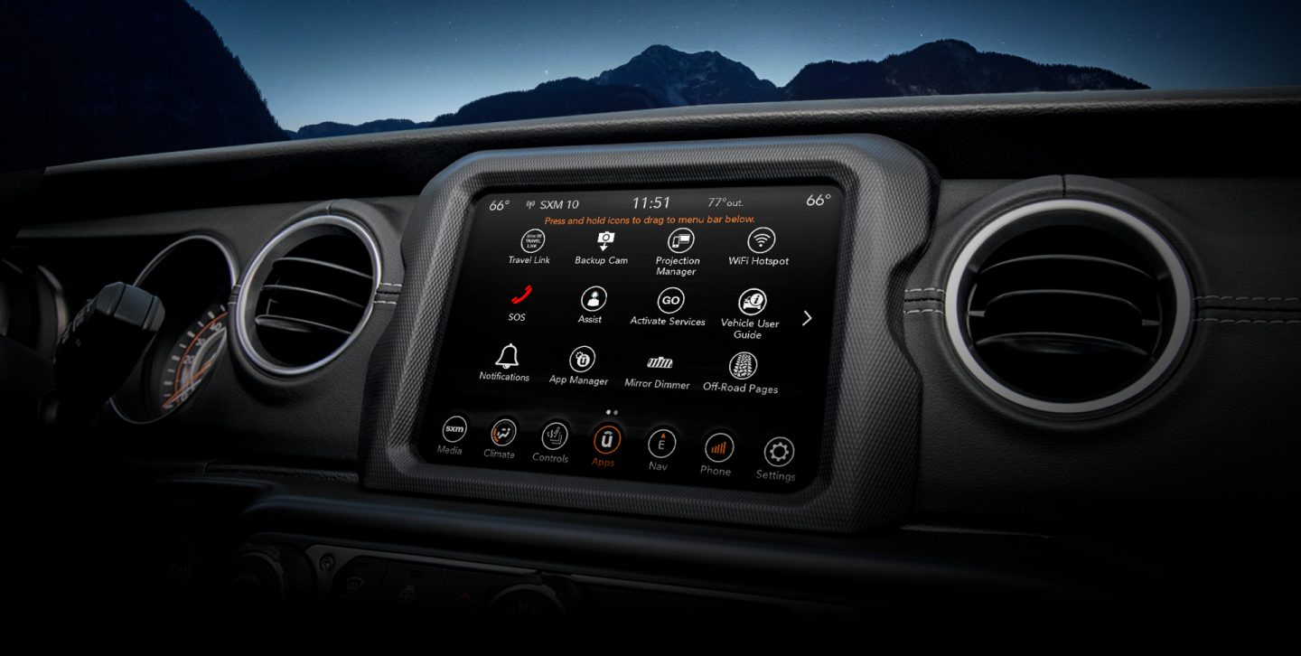 A close-up of the 8.4-inch Uconnect touchscreen in the 2022 Jeep Gladiator displaying navigation selections.